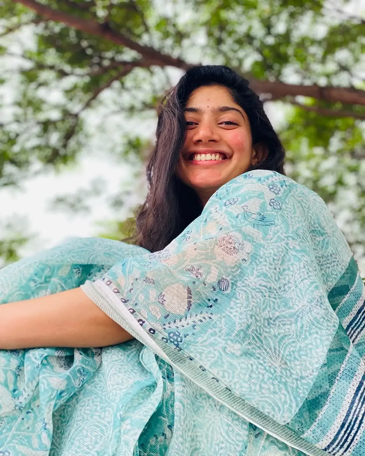 Indian Actress Sai Pallavi Smiling Face in Sleeveless Blue Saree